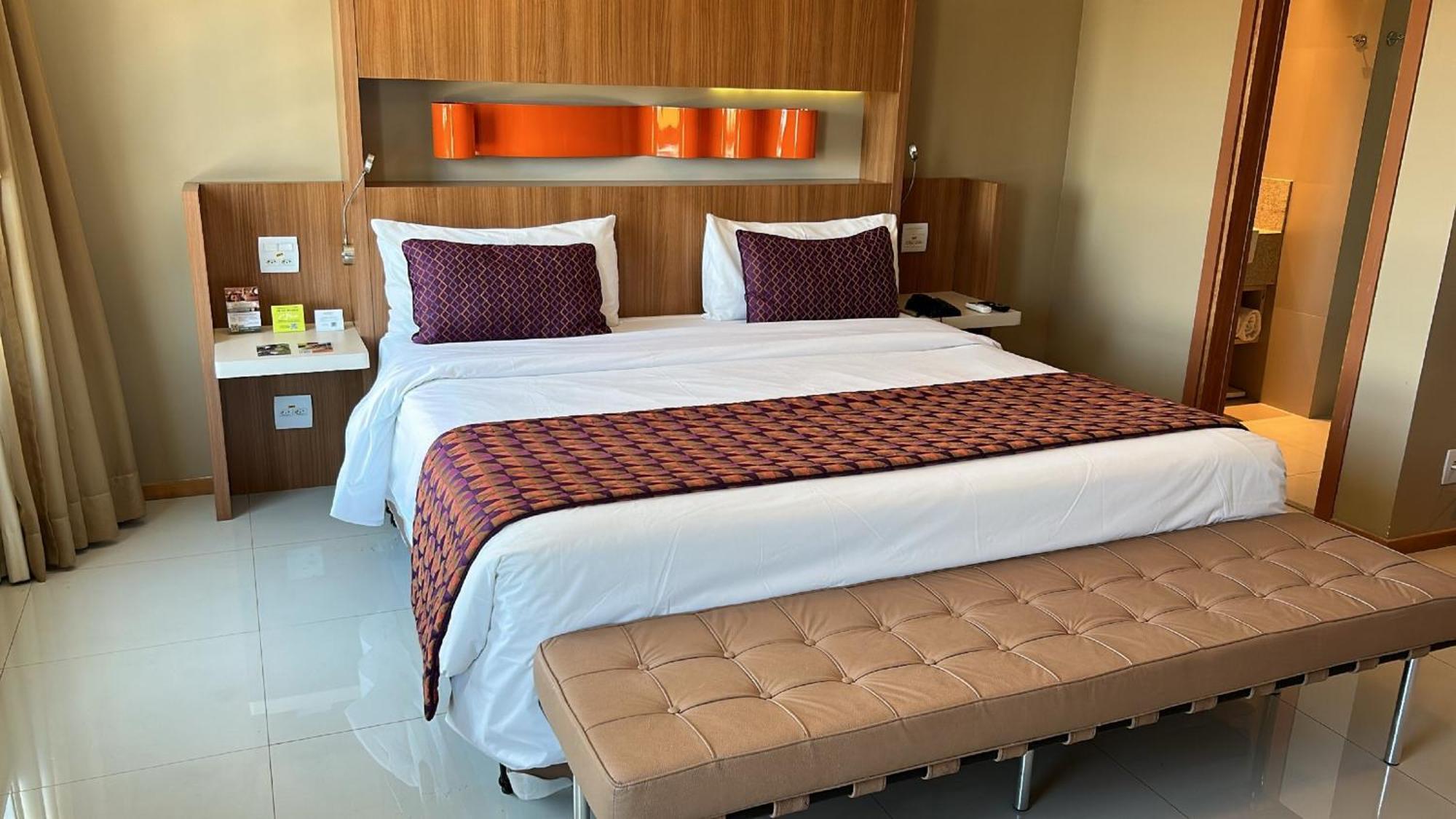 Jade Hotel Brasilia Candangolandia Exterior foto A bed in a hotel room